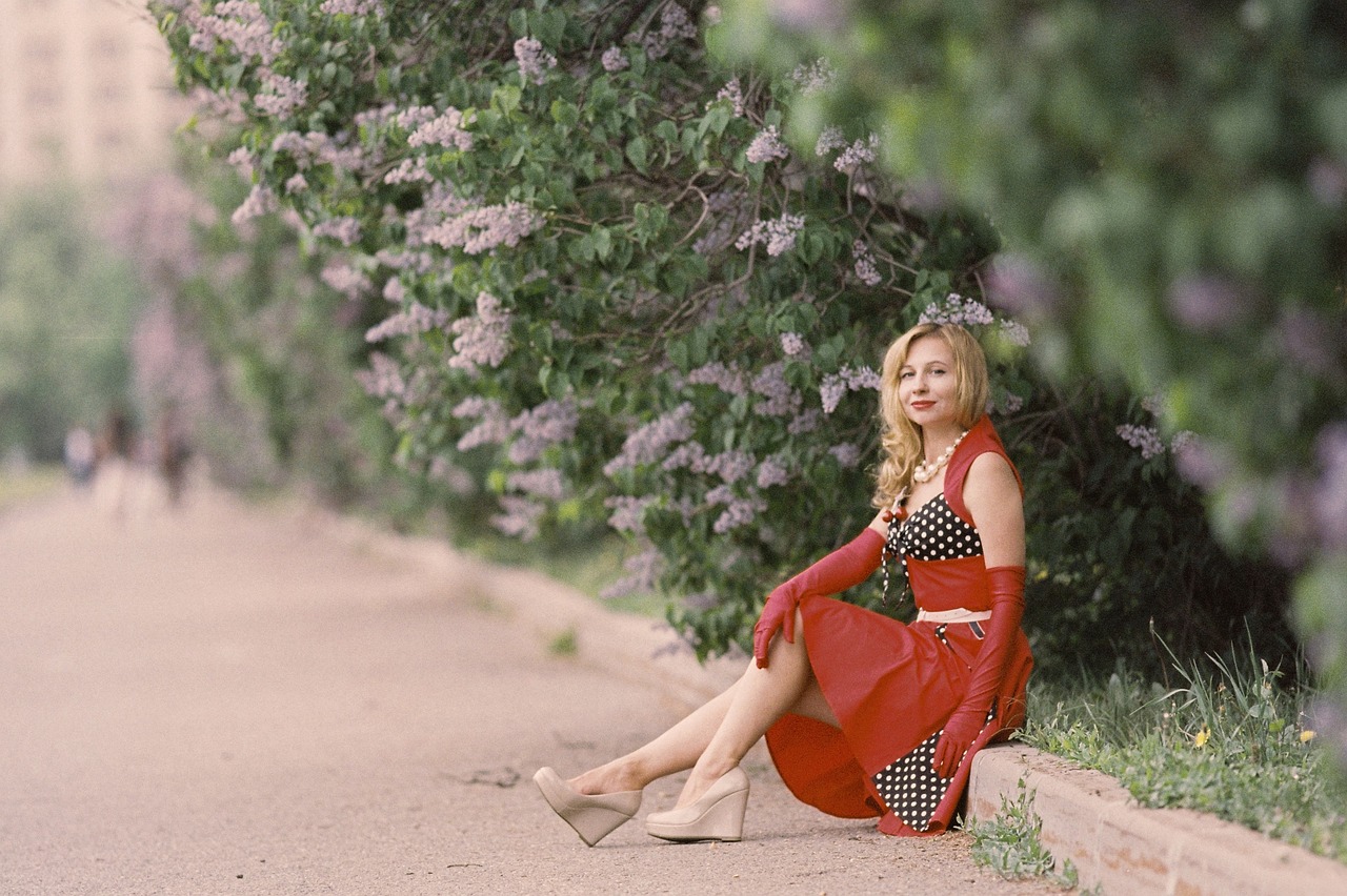 Woman in her 40s wearing a red dress